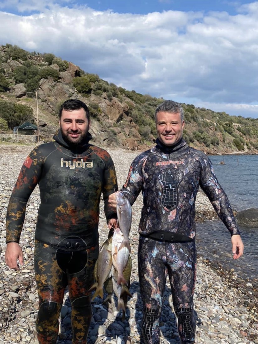 Sadettin Saran Assos'da balık tuttu. Çöp topladı